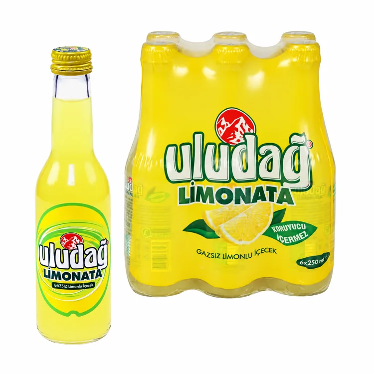 Uludag Limonata lemon drink bottle and yellow six-pack on white